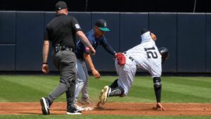 Grisham goes from hero to strange mistake in 24 hrs as Yankees lose 1-0 to Mariners