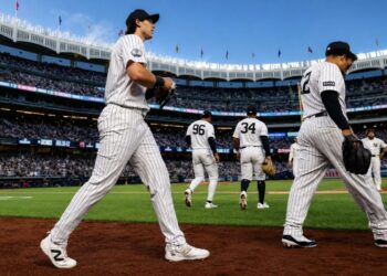 OFs Spencer Jones and Trent Grisham were returning to dugout after the Yankees' 10-5 win over the Mariners, New York, August 12, 2026.