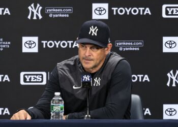 Manager Aaron Boone talks to reporters after the Yankees' 12-2 loss to 5-3 the Mets, New York, September 12, 2026.