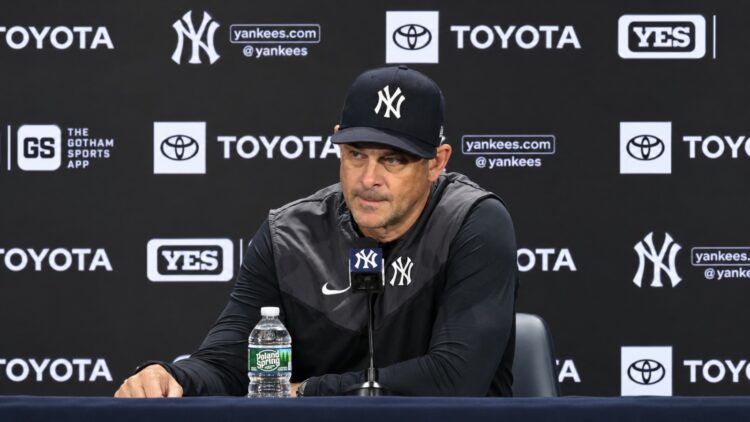 Manager Aaron Boone talks to reporters after the Yankees' 12-2 loss to 5-3 the Mets, New York, September 12, 2026.