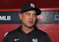 Aaron Boone speaks to reporter ahead of the Yankees' 9-2 win over the Diamondbacks in Phoenix, Arizona, September 18, 2026.