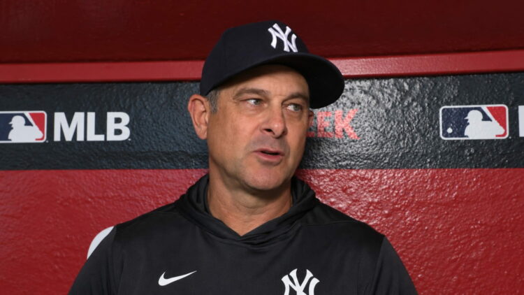 Aaron Boone speaks to reporter ahead of the Yankees' 9-2 win over the Diamondbacks in Phoenix, Arizona, September 18, 2026.