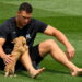 Aaron Judge is with his pet dog Gus before the Yankees' 7-3 win over the Angels, Anaheim, September 1, 2026.