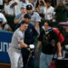 Ben Rice rushes to meet photographer Steven Park, who was hit by his foul ball, in the Yankees' 6-3 win over the Angels, Anaheim, September 2, 2026.