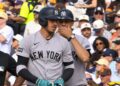 Cody Bellinger talks to first-base coach in the Yankees' 4-3 loss to the Padres, San Diego, September 6, 2026.