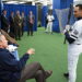 President George W. Bush talks to Derek Jeter before throwing out the ceremonial first pitch in Game 3 of the World Series between the Arizona Diamondbacks and the New York Yankees, New York, October 30, 2001.
