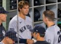 Spencer Jones talks to Judge and rice in the dugout during the Yankees' 3-2 loss to the Padres, San Diego, September 4, 2026.