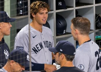 Spencer Jones talks to Judge and rice in the dugout during the Yankees' 3-2 loss to the Padres, San Diego, September 4, 2026.