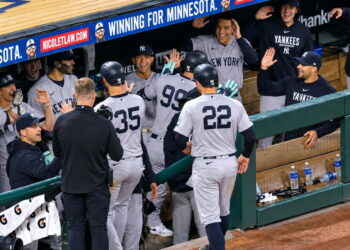 The dugout erupts over Aaron Judge's home run in the Yankees' 8-3 win over the Twins, Minnesota, September 14, 2026.