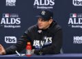 Aaron Boone talks to reporters after the Yankees' 4-3 ALDS loss to the Rays, New York, October 7, 2026.