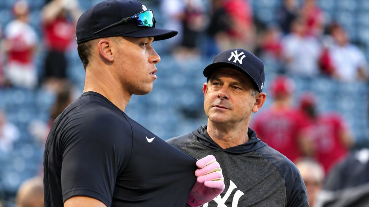 Yankees' manager Aaron Boone and aaron judge. Aug. 2025.