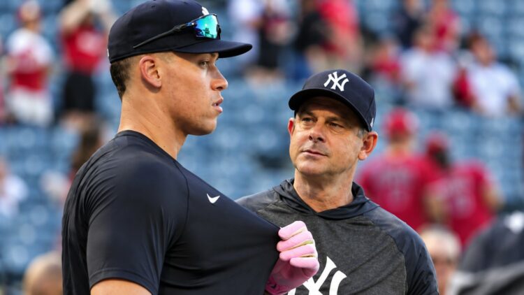 Yankees' manager Aaron Boone and aaron judge. Aug. 2025.