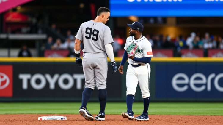 New York Yankees right fielder Aaron Judge (99) and Seattle Mariners left fielder Randy Arozarena (56) talk during the sixth inning at T-Mobile Park during Monday’s game.