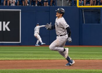 Austin Wells runs to third from second despite 3B coach asking him to stop. He was caught in the Yankees' 1-0 ALDS loss to the Rays, Tampa, October 3, 2026.