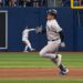 Austin Wells runs to third from second despite 3B coach asking him to stop. He was caught in the Yankees' 1-0 ALDS loss to the Rays, Tampa, October 3, 2026.