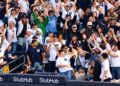 Baseball fans celebrate after the Yankees' 9-2 rout of the Red Sox at Yankee Stadium, New York, September 30, 2026 to advance to MLB ALDS.