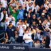 Baseball fans celebrate after the Yankees' 9-2 rout of the Red Sox at Yankee Stadium, New York, September 30, 2026 to advance to MLB ALDS.