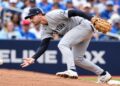 3B Ryan McMahon let a Yandy Diaz chopper skip off his glove on Cam Schlittler's second pitch in the Yankees' 5-2 ALDS loss to the Rays, Tampa, October 5, 2026.