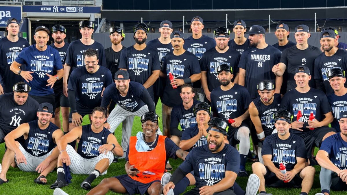 The Yankees at group photo session after 9-2 rout of the Red Sox to win Wild Card Series at Yankee Stadium, New York, September 29, 2026.