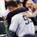 Yankees manager Aaron Boone hugs Aaron Judge after he hit 61st home run on Sept. 28, 2022, at Toronto.