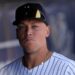 New York Yankees outfielder Aaron Judge walks in the dugout before a spring training game against the Atlanta Braves earlier this month in Tampa.