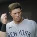 York Yankees third baseman DJ LeMahieu checks a PitchCom receiver prior to a baseball game against the Baltimore Orioles, Tuesday, May 17, 2022, in Baltimore.