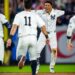 New York Yankees’ Juan Soto, right, reacts after hitting the winning base hit during the 10th inning of a baseball game against the Boston Red Sox at Yankee Stadium, Thursday, Sept. 12, 2024, in New York.