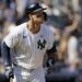 New York Yankees’ Aaron Judge watches his two-run home run during the third inning of a baseball game against the Boston Red Sox, Sunday, Sept. 15, 2024, in New York.