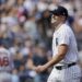 New York Yankees starting pitcher Carlos Rodon walks off the field during the fifth inning of a baseball game against the Boston Red Sox, Sunday, Sept. 15, 2024, in New York. 