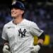 New York Yankees' Ben Rice reacts to fans cheering for him after flying out to Baltimore Orioles center fielder Cedric Mullins during the fourth inning of a baseball game, Wednesday, June 19, 2024, in New York. 