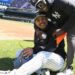 Yankees pitcher Nestor Cortes is with team's fitness trainer Larry Adegoke at Yankee Stadium, Oct 1, 2024.