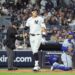 Yankees outfielder Aaron Judge #99 reacts after he strikes out swinging with two runners on during the first inning.