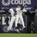 From left to right, Alex Verdugo, Aaron Judge and Juan Soto celebrate after Game 1 of the baseball AL Championship Series against the Cleveland Guardians Monday, Oct. 14, 2024, in New York. The Yankees won 5-2.