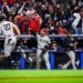 Yankees' dugout erupts in joy as Giancarlo Stanton's clutch homer restores the Yankees' lead over the Guardians in Cleveland on Oct. 18, 2024.