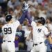 The Yankees’ Aaron Judge (99) celebrates with Giancarlo Stanton after hitting a home run against the Dodgers on June 9.