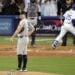 New York Yankees starting pitcher Carlos Rodón (55) looks to the outfield after giving up a home run to Los Angeles Dodgers’ Tommy Edman (25) during the second inning in Game 2 of the baseball World Series, Saturday, Oct. 26, 2024, in Los Angeles.