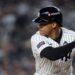 Sep 1, 2024; Bronx, New York, USA; New York Yankees right fielder Juan Soto (22) tosses his helmet after flying out to end the sixth inning against the St. Louis Cardinals at Yankee Stadium.